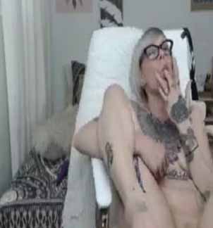 sexy-hot-blonde-with-cool-tattoos-enjoys-masturbating-with-vibrator